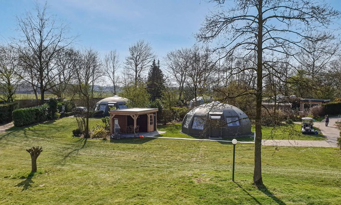 Municipality of Alphen-Chaam House | These detached bungalows with domed roofs are scattered in a wooded resort.
