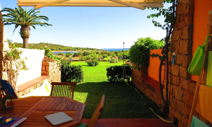 San Teodoro Apartment | Three-room garden apartment with sea view, 200m from Salina Bamba and 800m from Cala Brandinchi