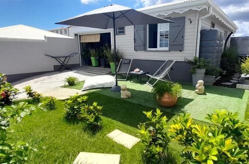 Sainte-Luce House | TI GARDEN et son jacuzzi privé à Ste Luce