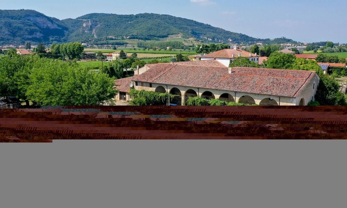 Longare Apartment | Tigli apartment with two bedrooms and one bathroom on the second floor with 4 metre glass window (apartment 6)