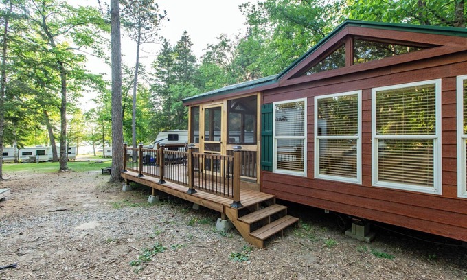 Nevis House | Tiny house nestled in the woods with lake view. Pets Accepted!
