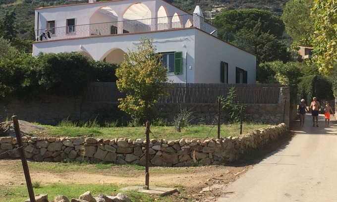 Arenella Villa | Top floor in a stunning villa on the sea with panoramic terrace and tennis court