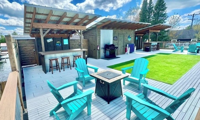Rapid City Cottage | Torch Lake Sandbar Directly Across the Street With Indoor Boat Slip Unit A
