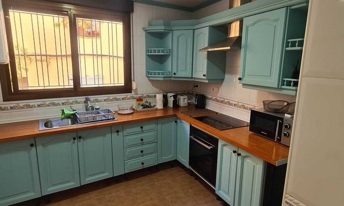 Lliria House | Town House with roof terrace and stunning views. Close to all local amenities
