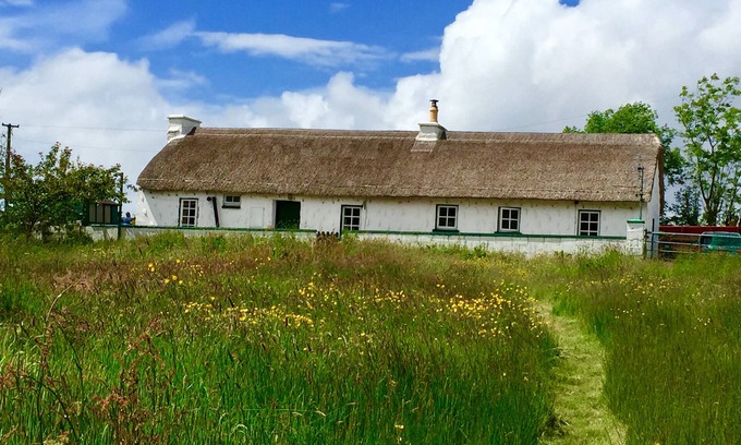 Bruckless Cottage | Traditional thatched cottage near the sea: log burner, paddock