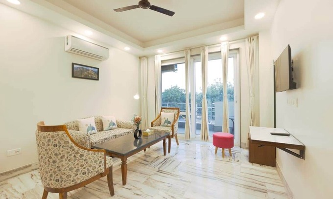 Sushant Lok Apartment | Tranquil 2BR Oasis with Balcony & Bathtub