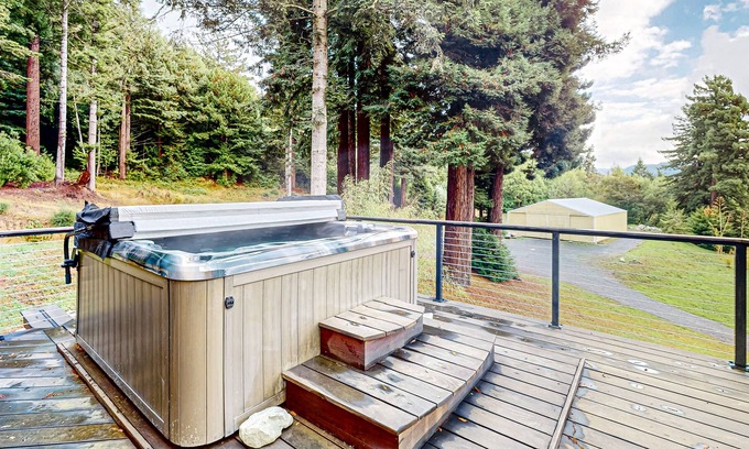 McKinleyville House | Tranquil and luxe river stay with wraparound deck, hot tub, sauna, & mtn views