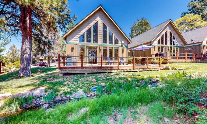 Klamath Falls House | Tree-lined cabin with large deck, pool, hot tub, & fireplace - dog-friendly