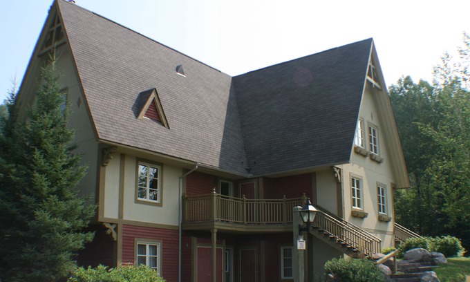 Mont-Tremblant Condo | Tremblant, on resort, sunny 4 bedroom, sleeps 8, pool, pond, 2 decks, fire pit