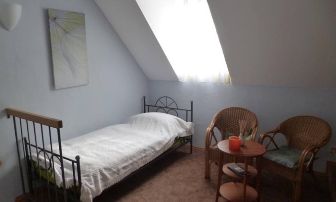 Weisenheim am Berg Bed & Breakfast | Triple room - Chardonnay - Alter Winzerhof