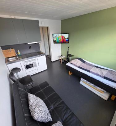 Trondheim Apartment | Trivelig studioleilighet på byåsen med treningsrom, uteareal og parkering