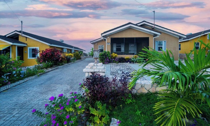 Falmouth House | Tropical Escape, Spacious 2 Bedroom Vacation Oasis with WiFi, AC