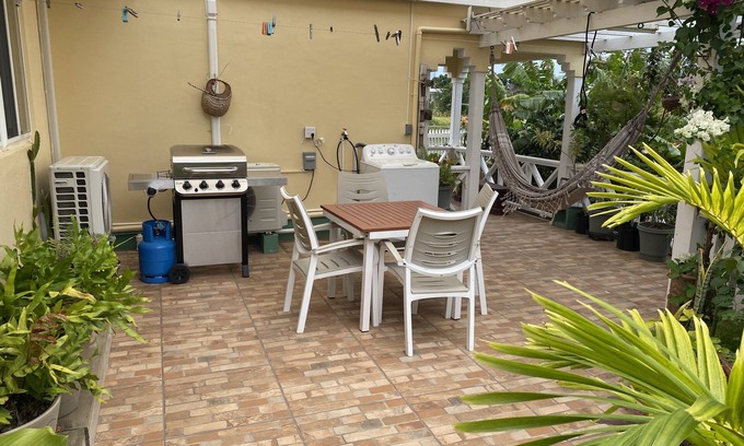 All Saints Apartment | Tropical garden cottage -private with patio & courtyard. Plus vehicle for rent