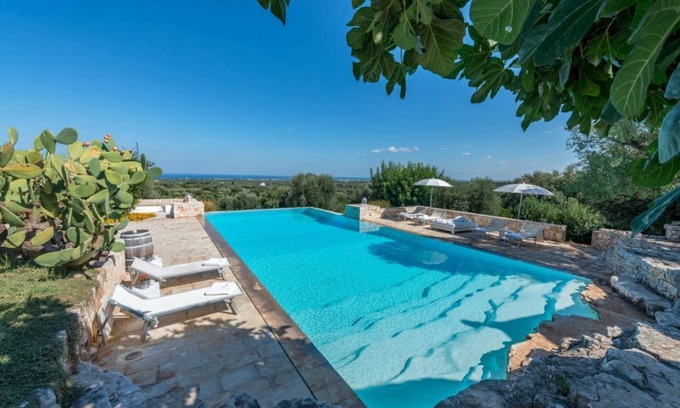 L'Assunta Villa | Trulli complex with luxurious infinity pool overlooking the sea