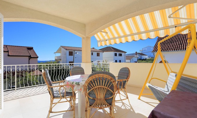 Seget Vranjica Apartment | Two bedroom apartment with terrace and sea view Seget Vranjica, Trogir (A-18487-c)