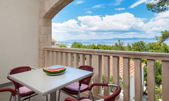 Postira Apartment | Two bedroom apartment with balcony and sea view Postira, Brač (A-15242-b)