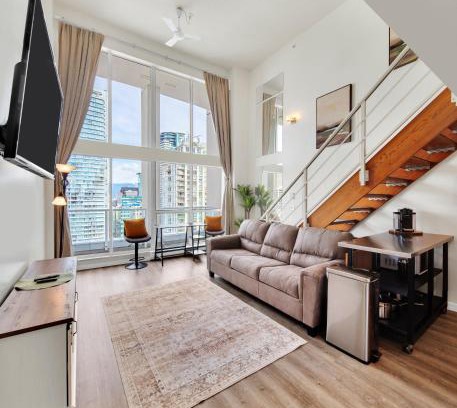 Downtown Vancouver Apartment | Two-Story Loft with a High-rises view and Rooftop Deck
