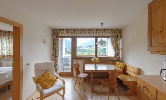 San Martino in Badia Apartment | Tyrolean style three-room apartment