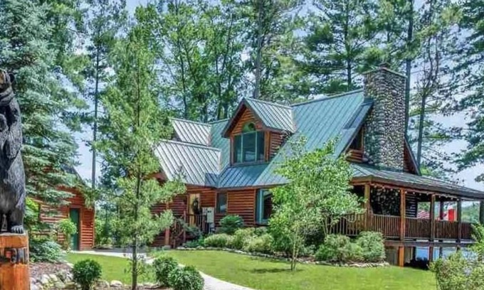 Long Lake House | Unique log cedar family vacation home with 185 feet of secluded lake frontage