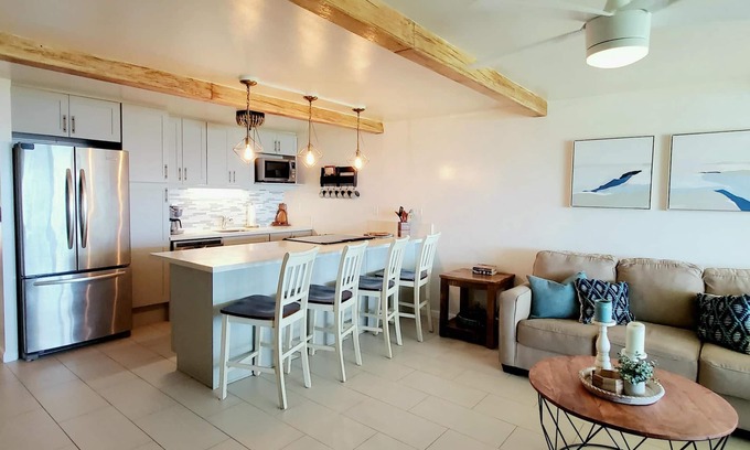 Punaluu Condo | Updated Oceanfront Condo! Long clean beaches to walk & swim! Escape the Crowds!