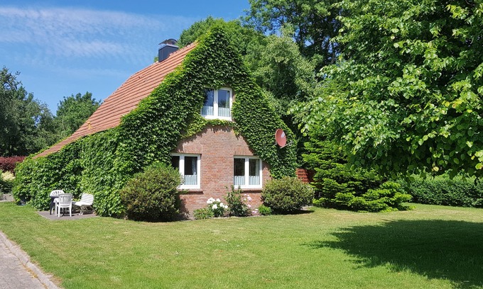 Dornumergrode Apartment | Vacation apartment directly on the North Sea with large garden and covered terrace