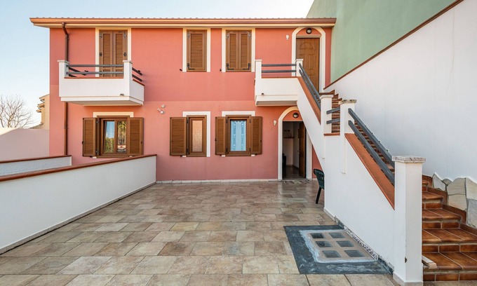 Sant'Antioco House | Vacation Home "Casa Vacanza L'Agave A" with Shared Terrace, A/C & Wi-Fi