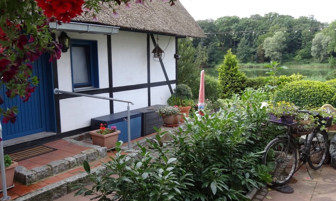 Bruel House | Vacation home with thatched roof at Kühlensee in the Sternberger Seenland Nature Park