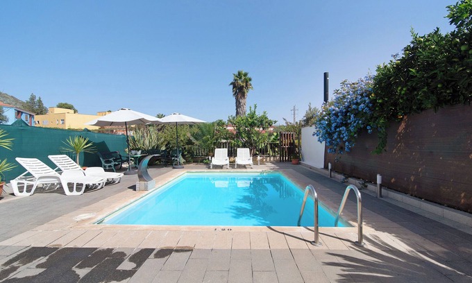 La Solana House | Vacation Home "El Llanete" with Mountain View, Shared Pool & Wi-Fi