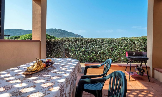 La Pelosa House | Vacation Home "Pergola 706" a few meters from the Beach with A/C & Private Terrace