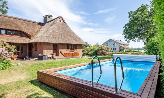Kirchbarkau House | Vacation home REETselig with pool, sauna, garden, fireplace OFC 12 - Holiday home