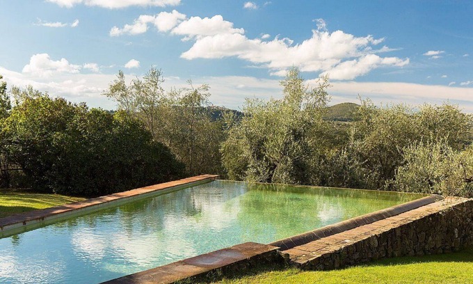 Radda in Chianti Villa | Villa Al Bosco: An elegant and welcoming three-story villa situated in a secluded location surrounded by meadows and by green hills, with Free WI-FI.