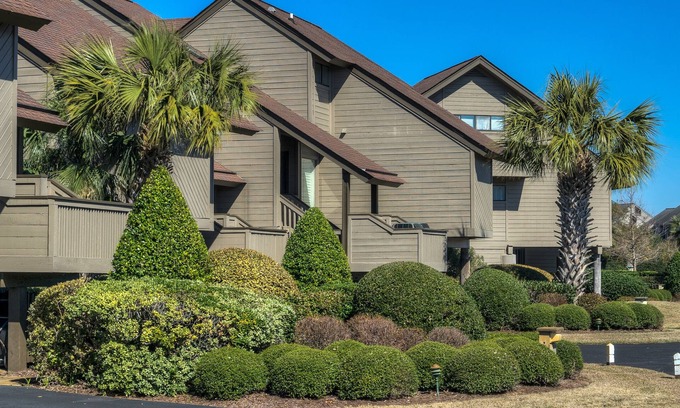 Litchfield by the Sea House | Villa close to ocean with pool access located within gated Litchfield By the Sea community.