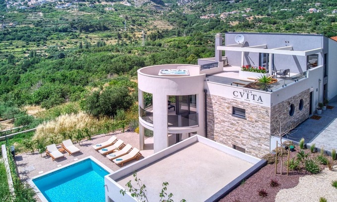 Klis Villa | VILLA CVITA is a modern 5-bedroom villa with a Jacuzzi, a Gym and Finnish Sauna, a heated pool, and amazing views