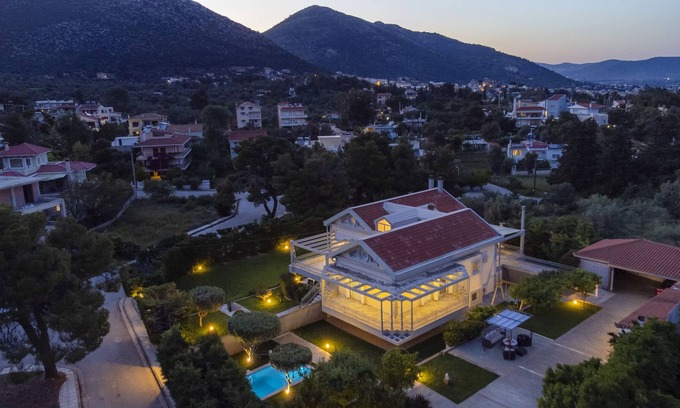 Nea Makri Villa | Villa 'Green Marble Livisi Pool Residence' with Mountain View, Wi-Fi and Air Conditioning