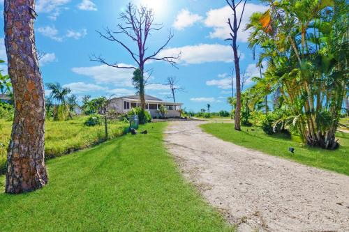 Saint James City House | Villa Island Retreat, Country house overlooking 13 acres and a small lake