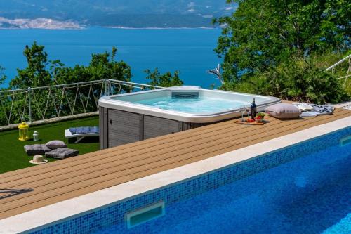 Lokva Rogoznica Villa | Villa Maruncela with sea and island views, 5 bedrooms, private pool, gym