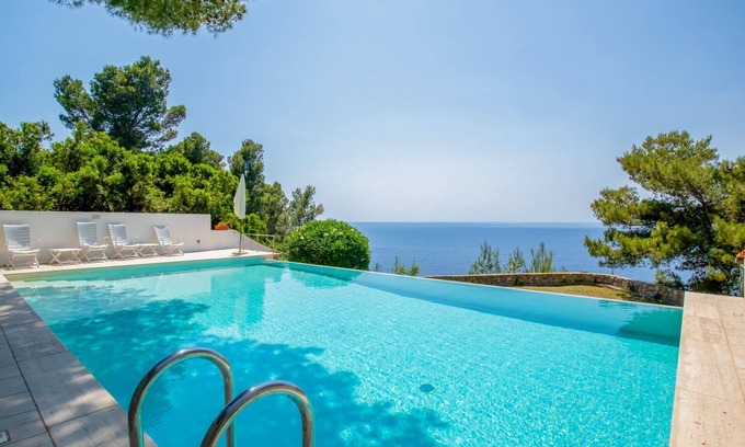Madonna delle Grazie Villa | Villa with infinity pool and private access to the sea