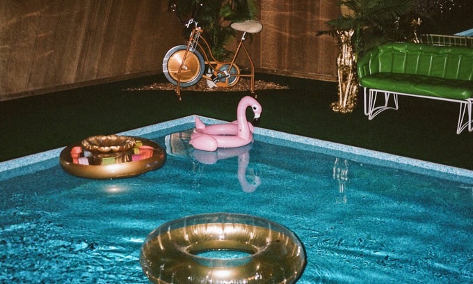 Stanchfield House | Vintage kitsch 70s/80s themed house with indoor pool and backyard creek