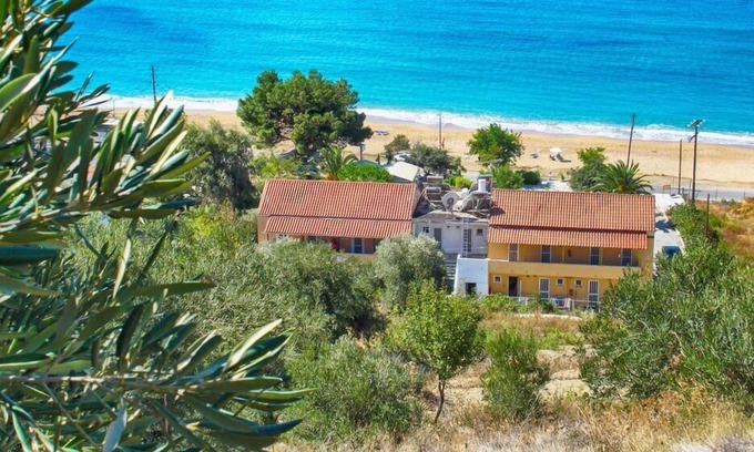 Agios Georgios Pagon Apartment | Vistonia Apartment 4 - right on the beach with sea views