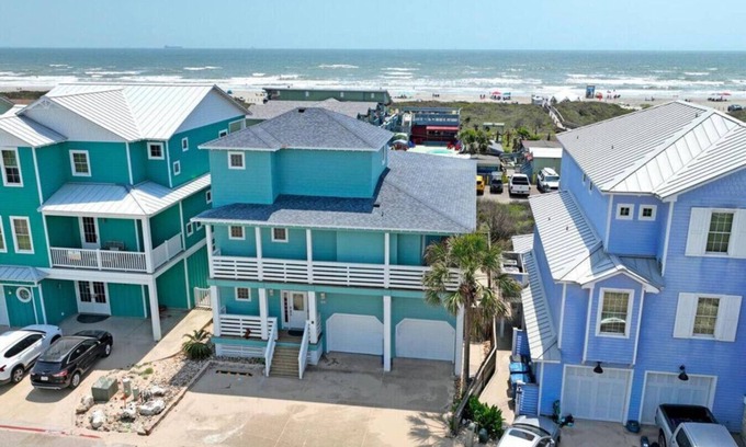 Sand Point House | Wake Up to Ocean Breezes: Elevator Access, Beach Views, and a Boardwalk to Paradise.