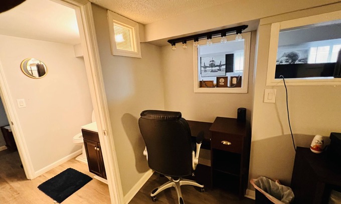 Troy House | Warm and cozy basement.