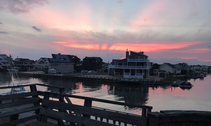 Osborn Island House | Watersports paradise, 65ft floating dock, bay in front, lagoon in back yard