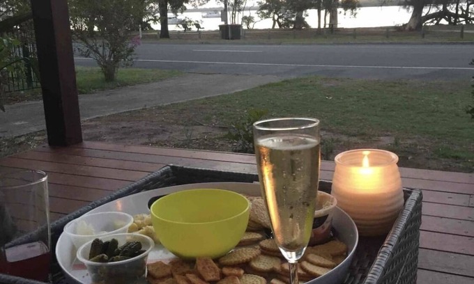 Banksia Beach House | Water front house with magical sunsets
