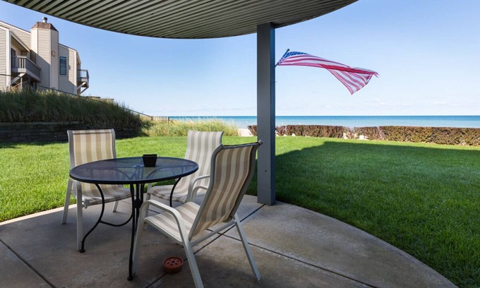 South Haven House | Water's Edge 1 | Beachfront Condo with Pool, Moments from Downtown