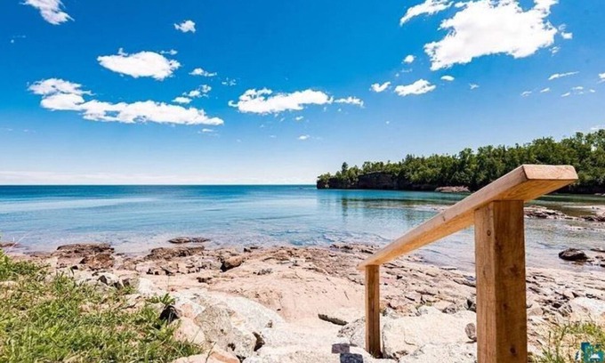 Two Harbors Condo | Water's Edge! Direct shoreline access; Condo with resort-like amenities