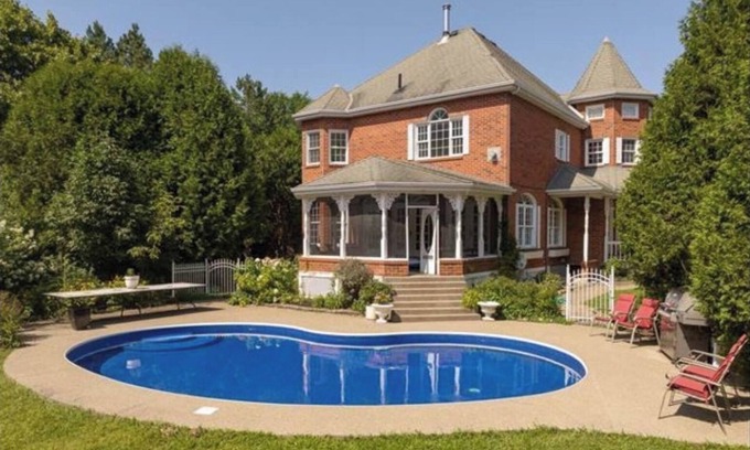 Vaudreuil House | Waterfront Heated pool Private acre yard BBQ Wood Fireplace