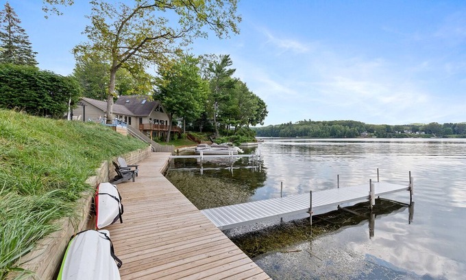 Newaygo Condo | Waterfront Suite: Dock, Kayaks, Firepit, BBQ