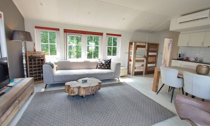 Loosdrecht House | Waterfront tranquility and comfort. Free parking.