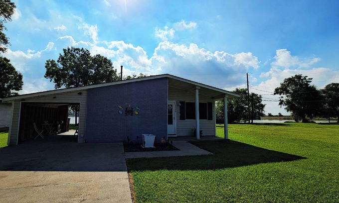 Port Arthur House | “Welcome to “Her LakeHouse”
