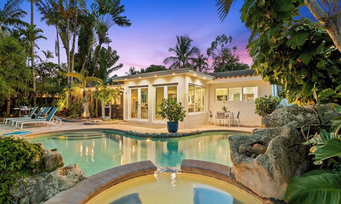 Coral Shores House | Welcome to Pineapple Paradise, A Spacious Modern Tropical Waterway Home!